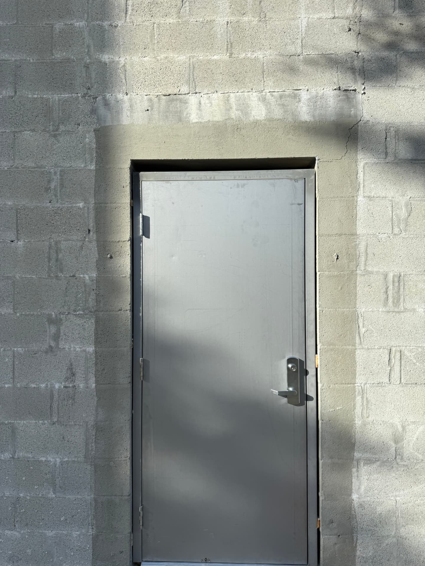 Hollow metal exterior door on masonry wall
